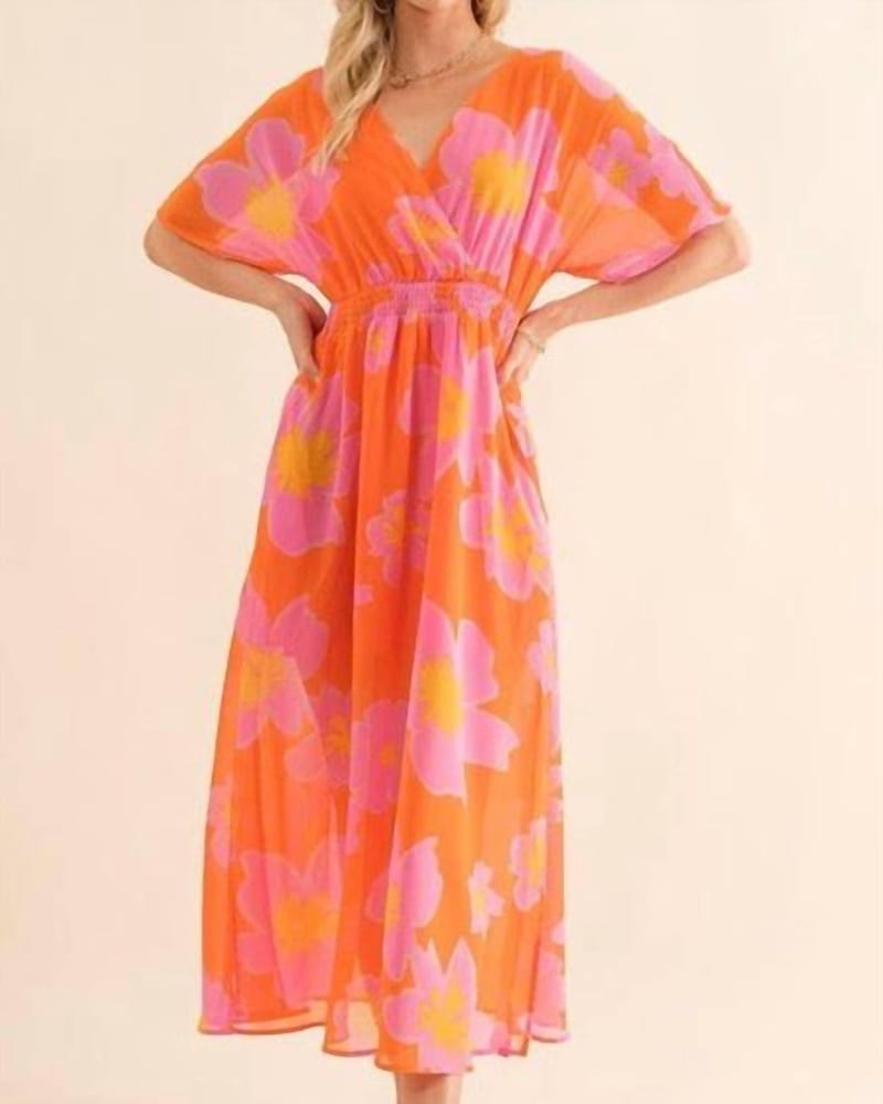 Front of a model wearing a size 3XL Calypso Breeze Maxi Dress In Orange in Orange by Cozy Co.. | dia_product_style_image_id:346792